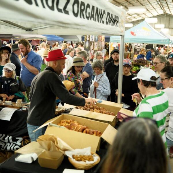 A busy stall holder at the Otway Producers Festival 2024, hosted by Otway Harvest Trail